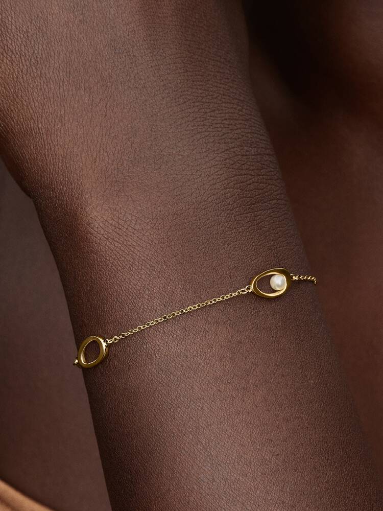 Bracciale con Perla d’Acqua Dolce ed Elementi Ovali – Finitura Oro